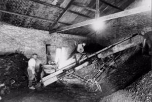 A mobile turnip cutting machine being used to shred clay